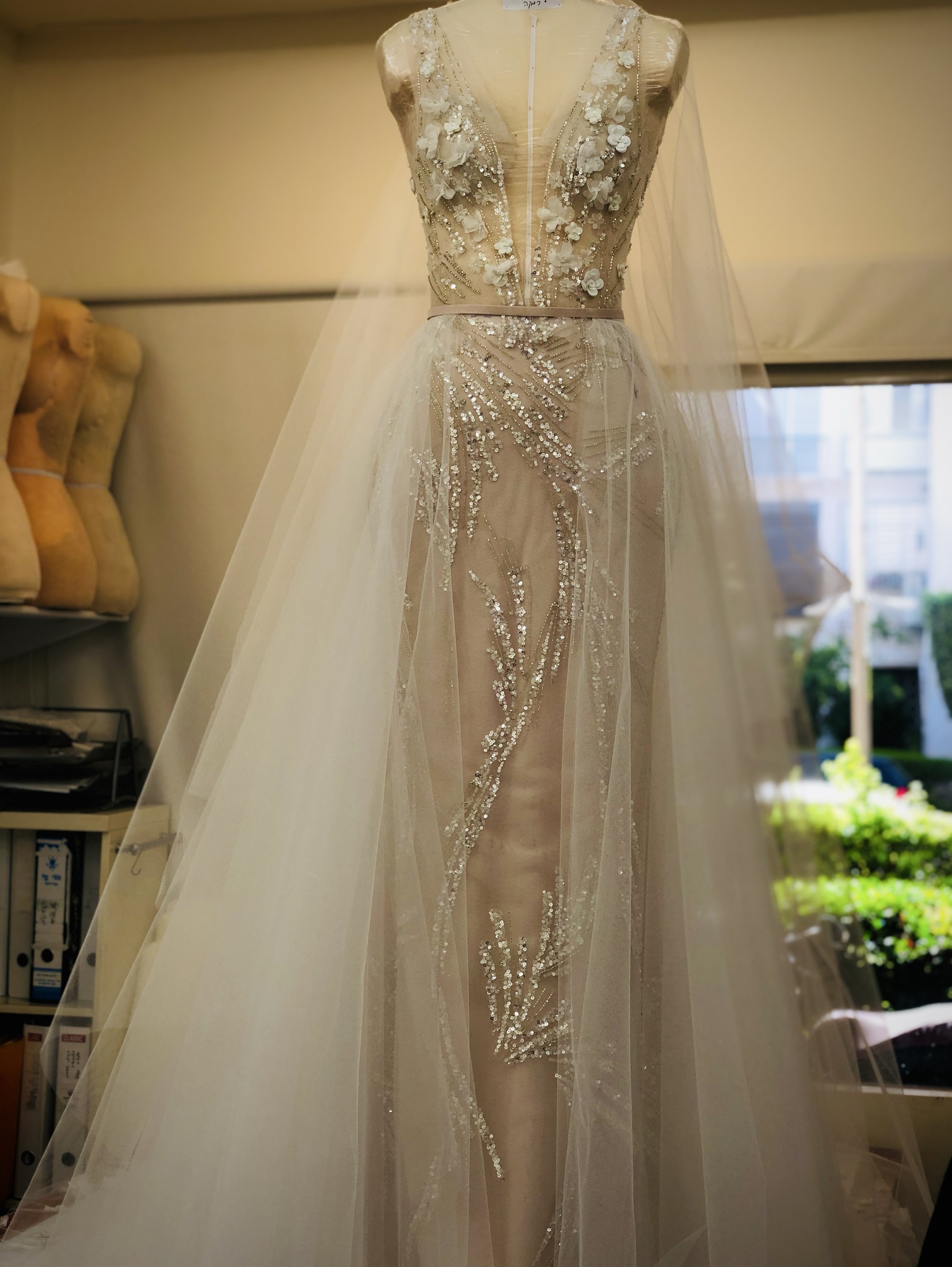 Hand-embellished bridal gown created in the atelier